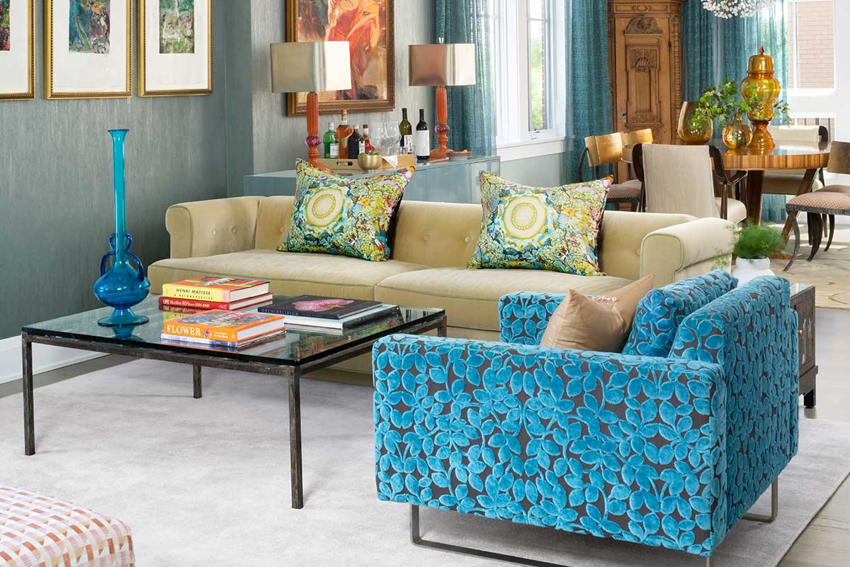 living room with blue and yellow chairs
