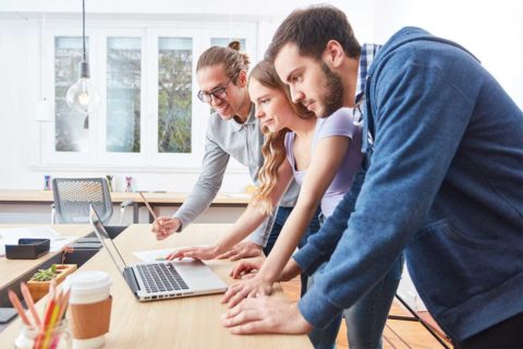 students working on computer