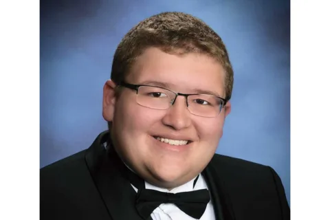 adam oakes graduation photo