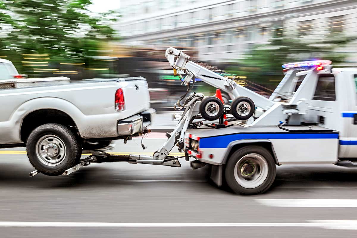 tow truck pulling truck