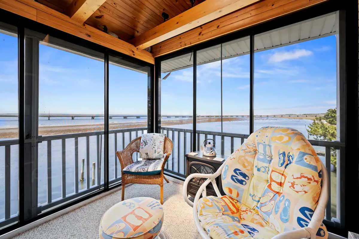 screened in porch overlooking bay