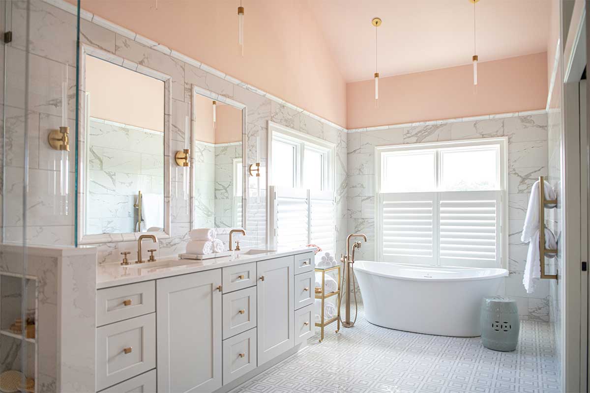white bathroom with peach ceilings