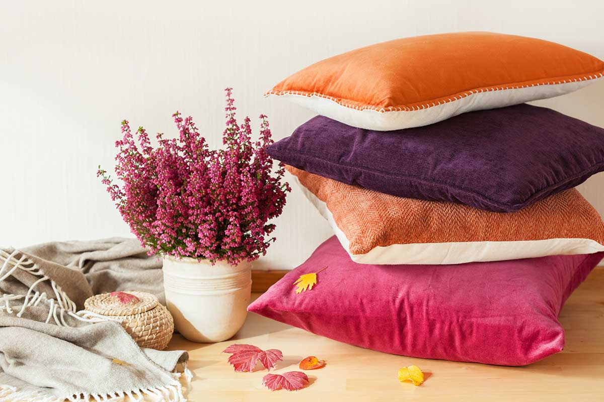 fall colored pillows and decor