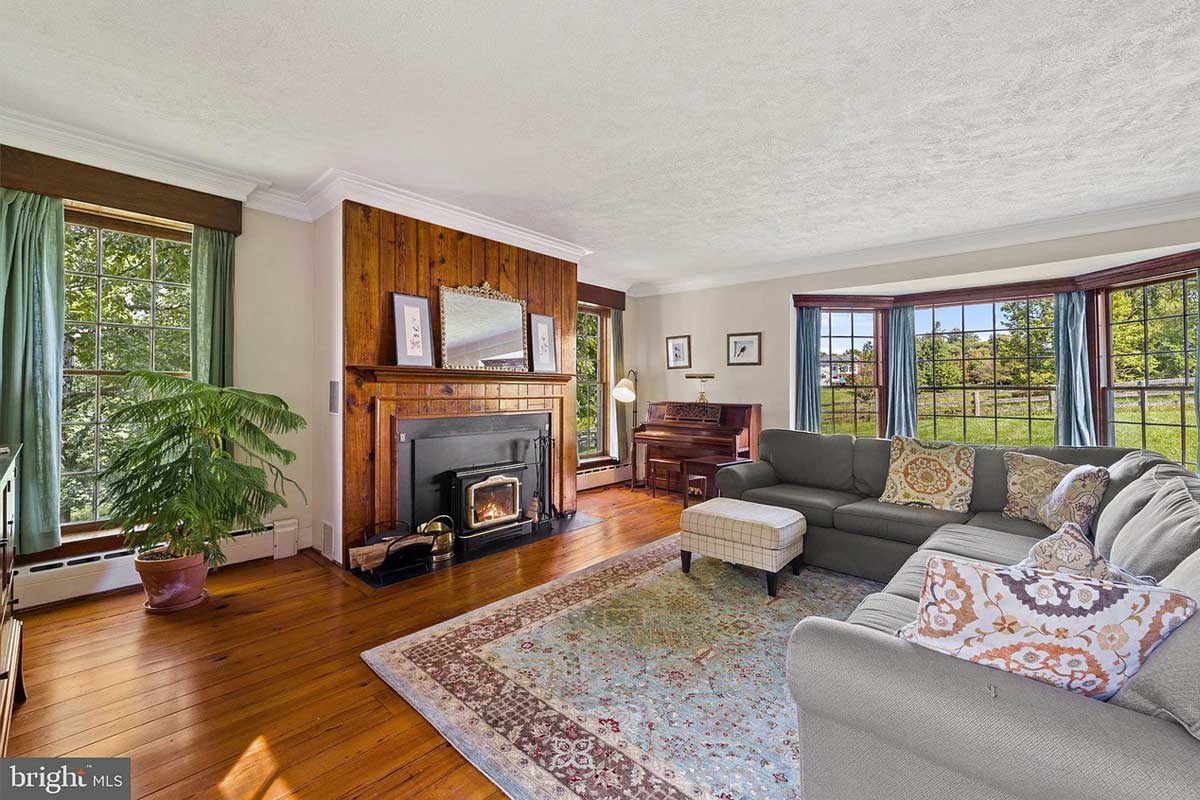 farmily room with fireplace and bay window