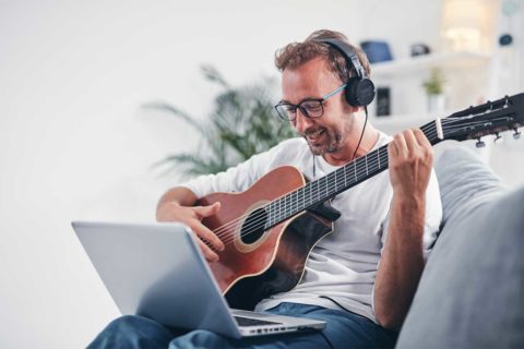 man playing guitar