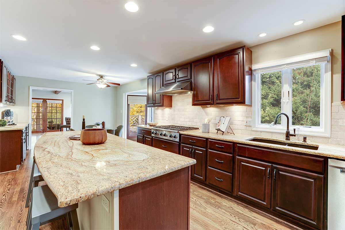 kitchen with wood cabinets and island