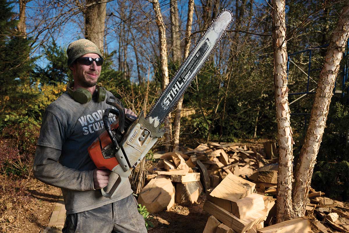 andrew mallon with chainsaw