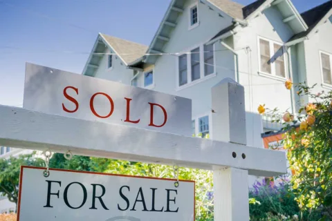sold sign outside home