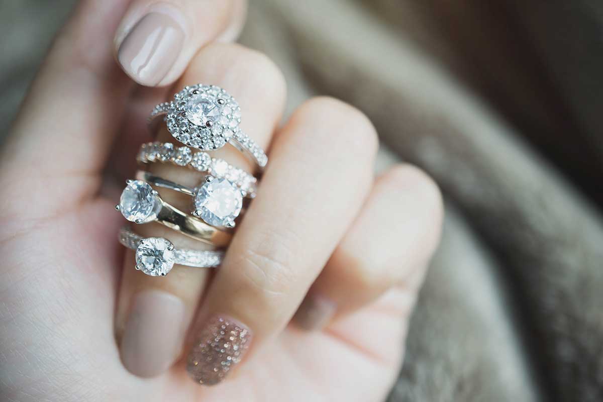 diamond rings on a woman's finger