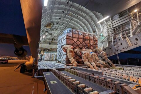 A Dover Air base crew loads a plane bound for Turkey.