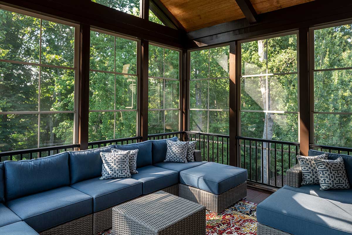 screened in porch looking out to wooded area