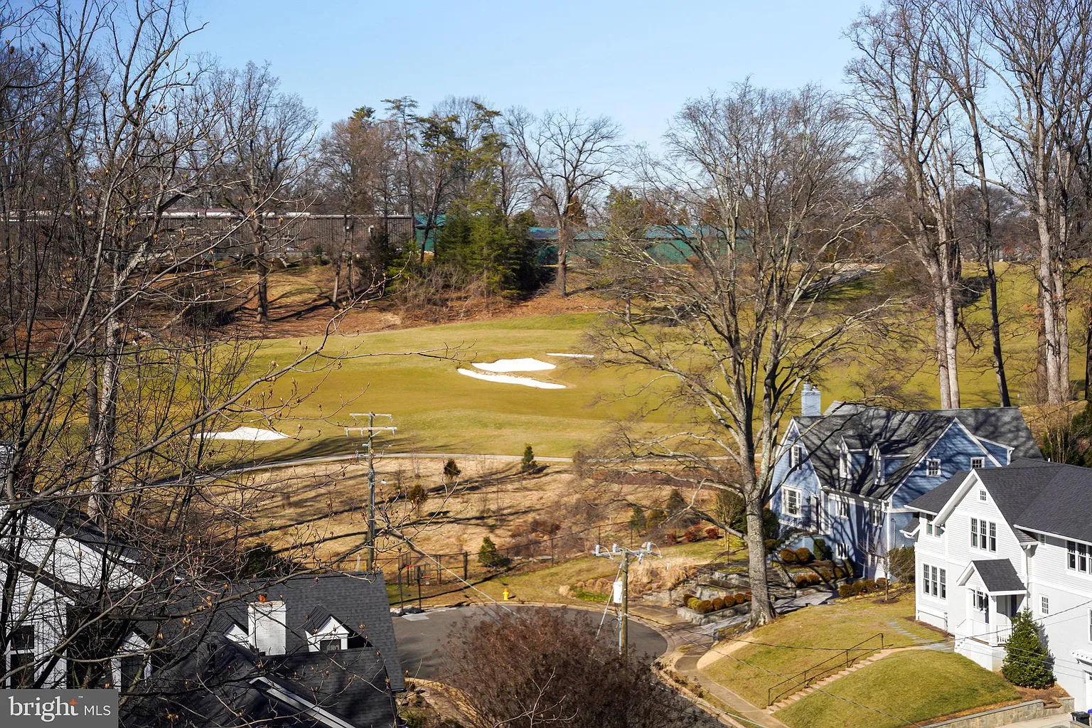 view of nearby gold course and neighborhood from Broyhill Forest home