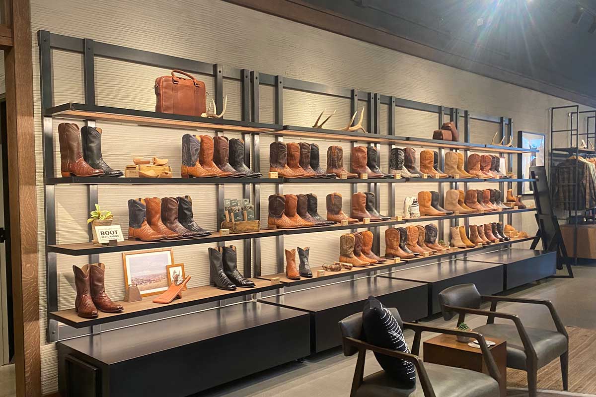 Shelf of boots at Tecovas