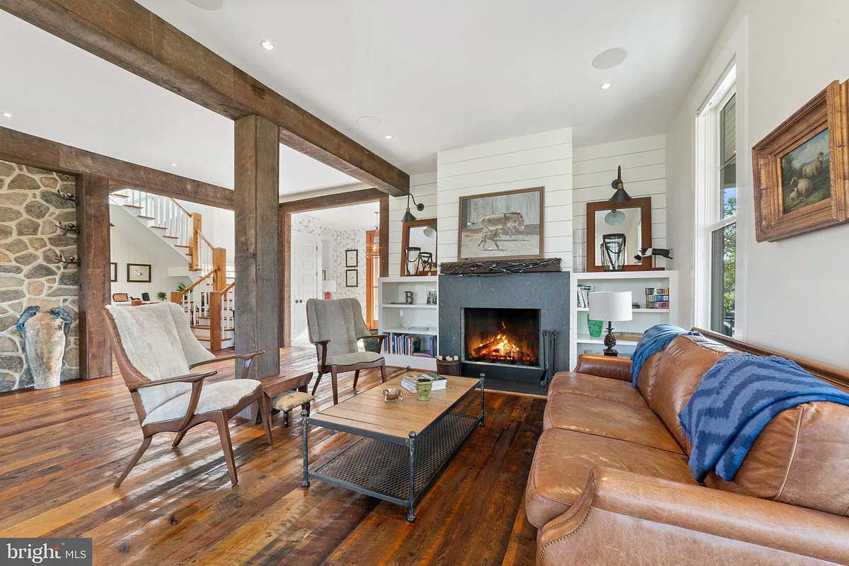 sitting room with fireplace and wood floors