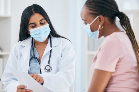 doctor in mask with patient in mask