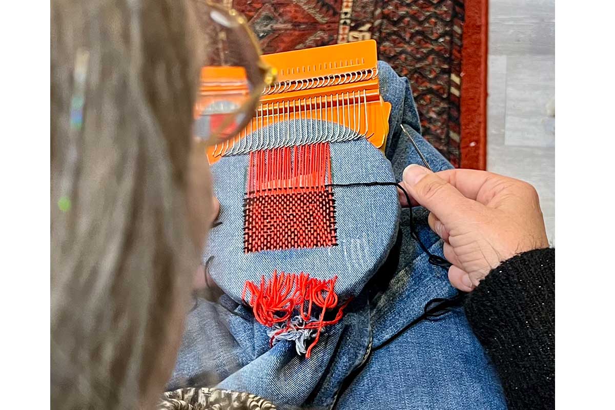 woman sewing denim
