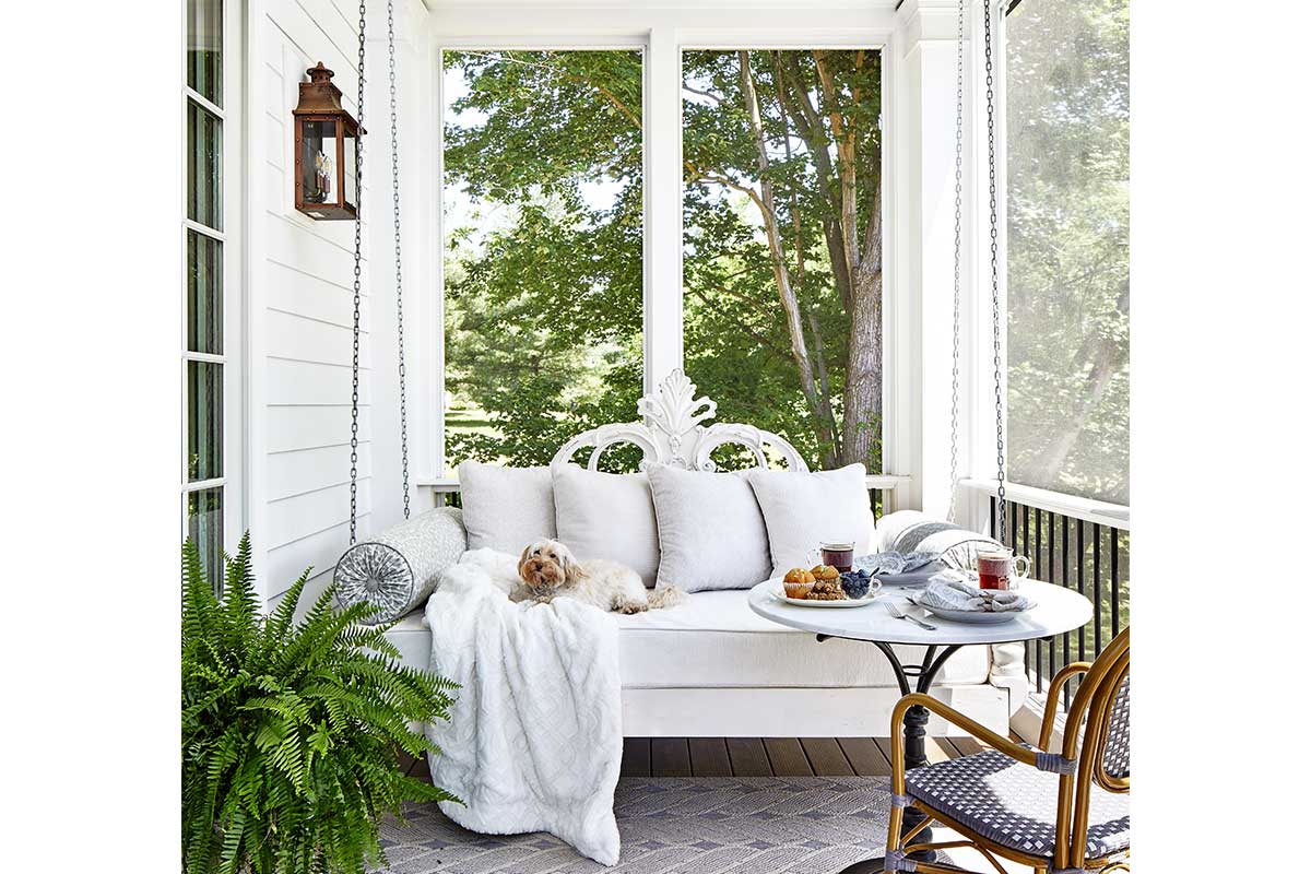 porch with swinging day bed