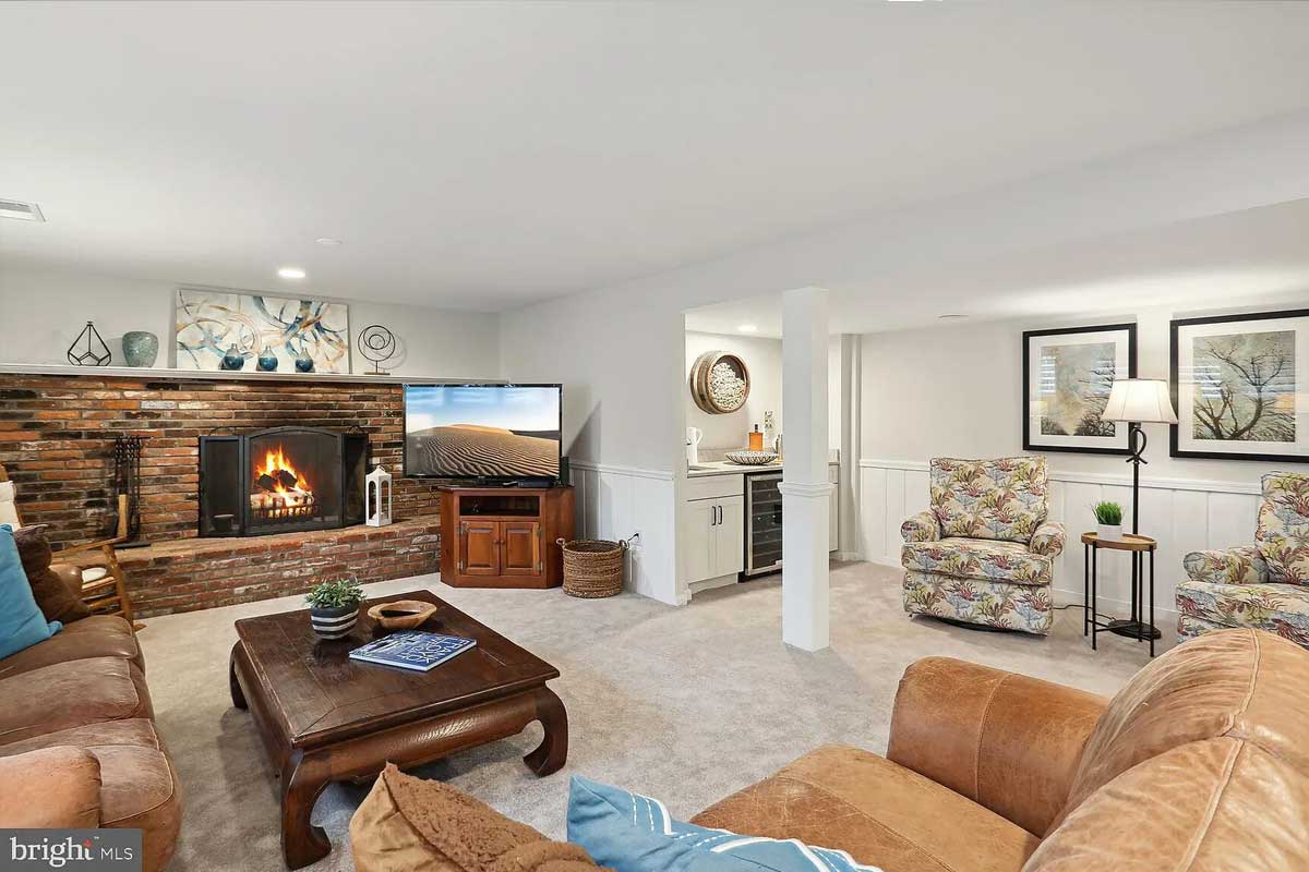 rec room with fireplace