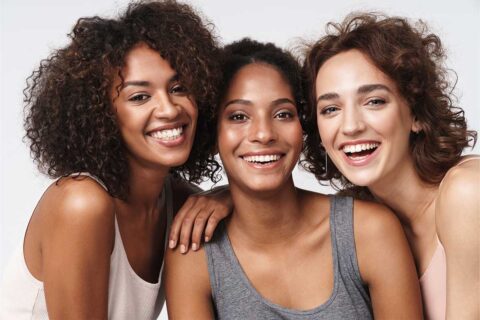 three women smiling