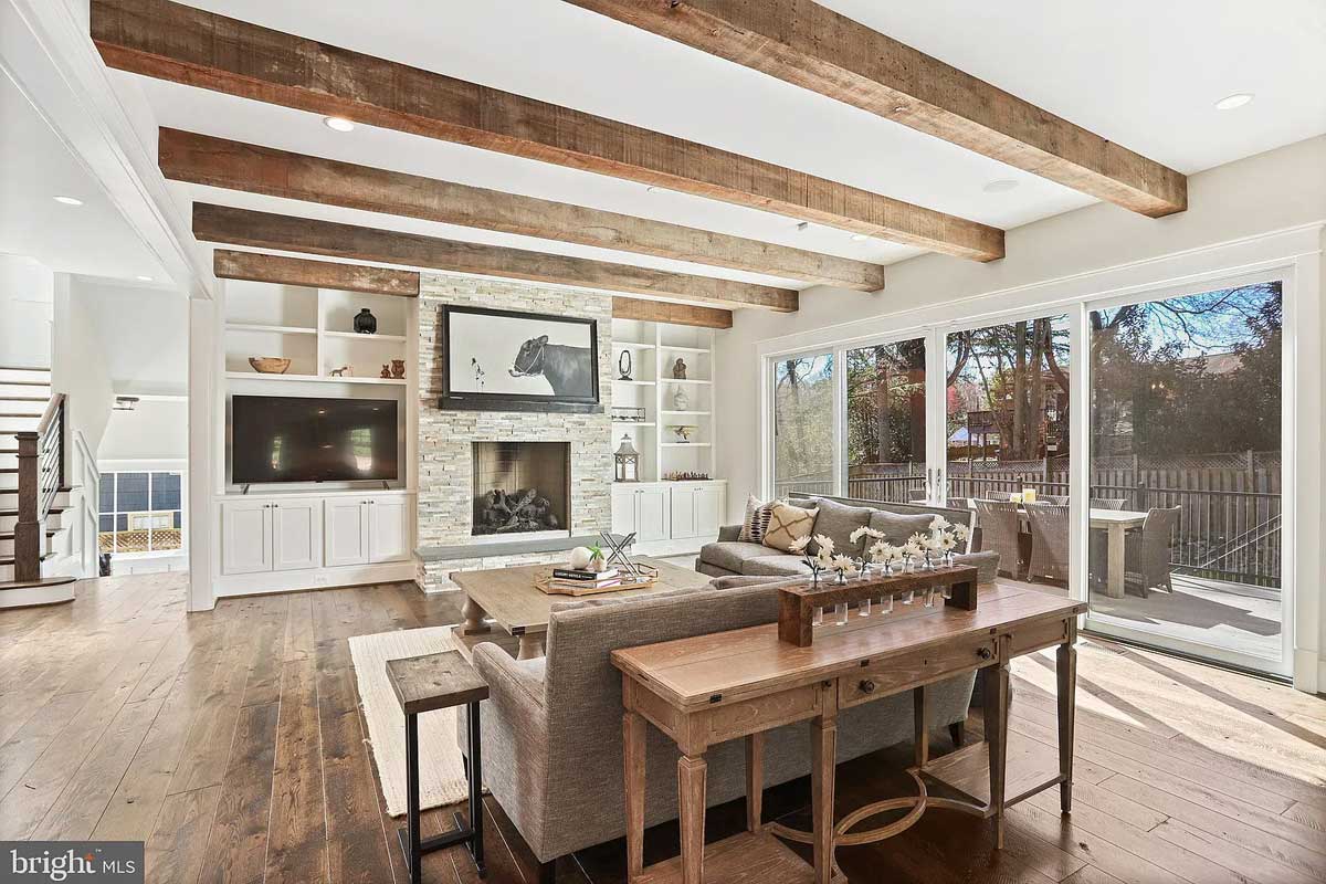family room with exposed beams
