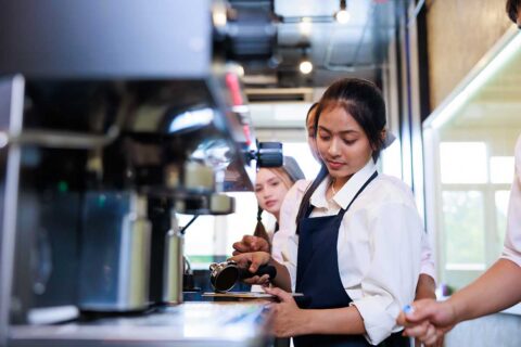 barista making coffee