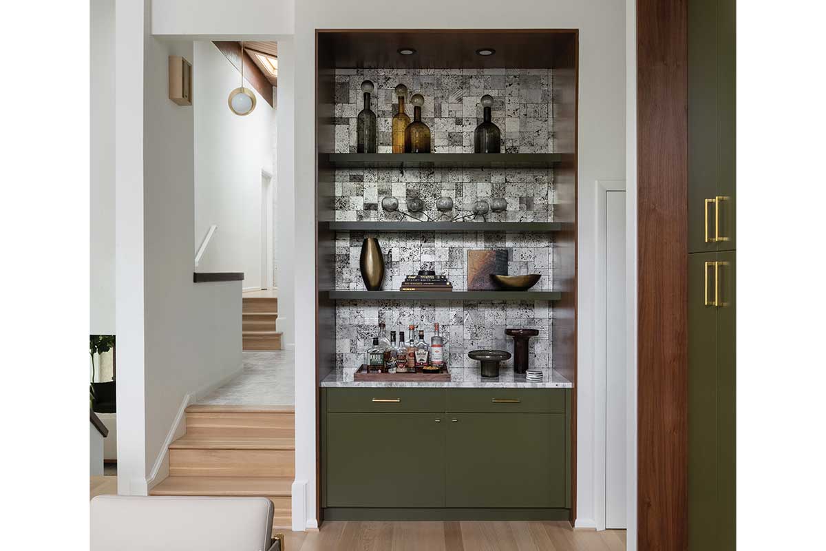 built-in storage with shelving and cabinet space in Lake Barcroft home
