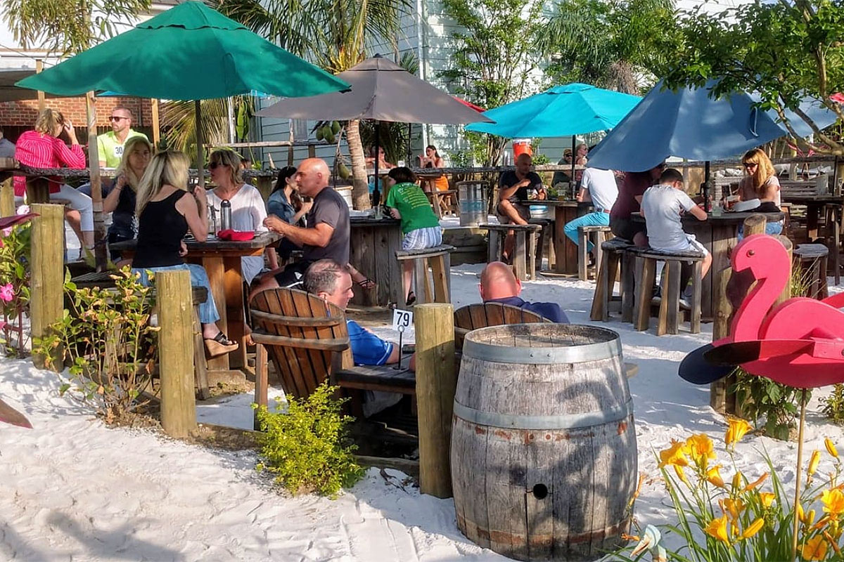 Outdoor dining at MacDowell's Beach in Leesburg. (Photo courtesy MacDowell Brew Kitchen)