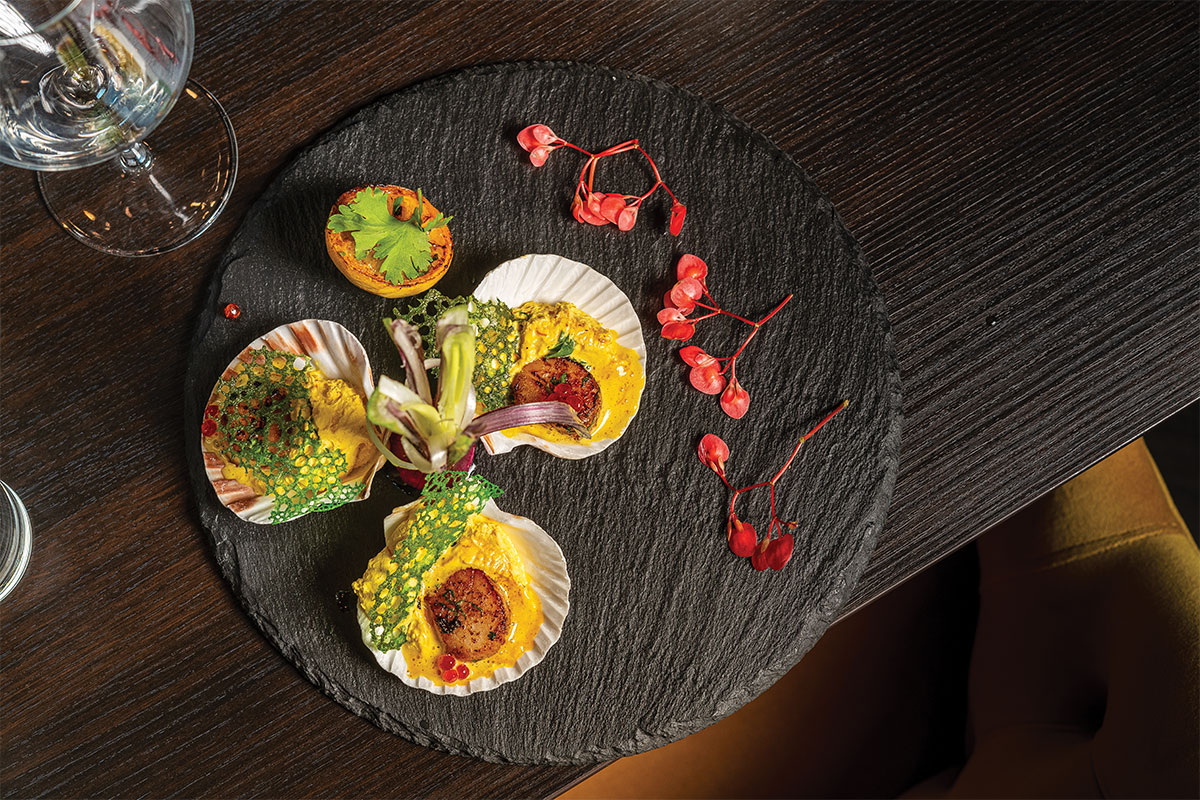 Indian food plated in seashells, from Celebration by Rupa Vira
