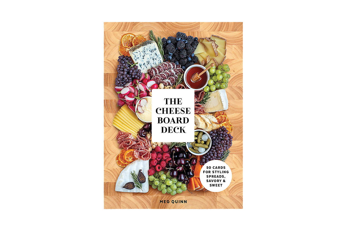 Cover of the Cheese Board Deck, with a photo of a cheese board