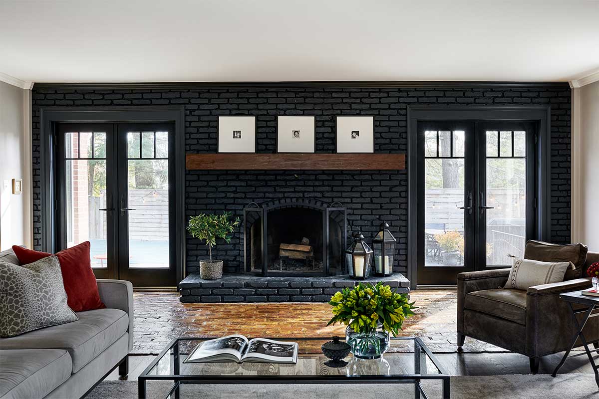 living room with black fireplace
