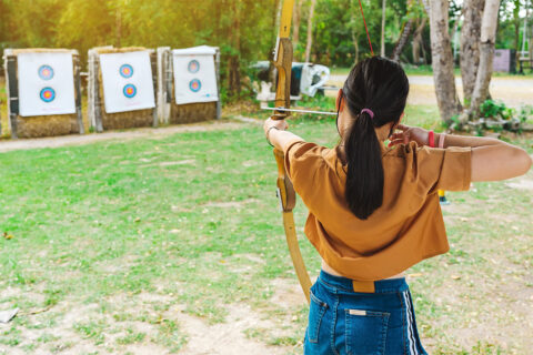Girl practicing archery