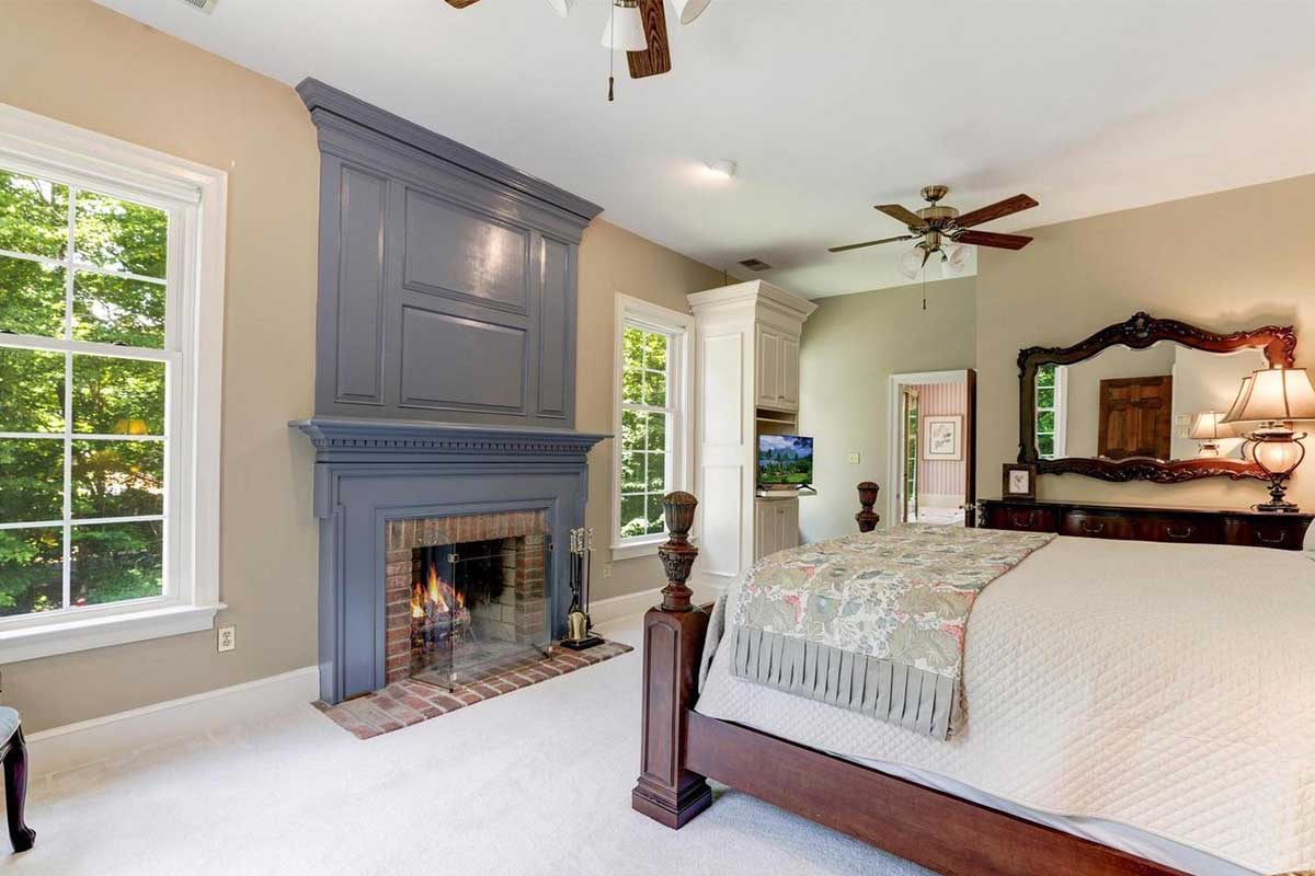bedroom with blue fireplace