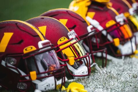 Commanders helmets on field