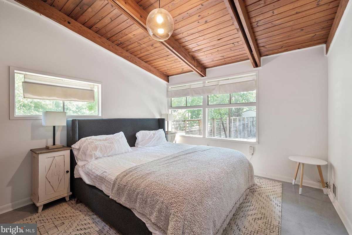 bedroom with wood ceilings