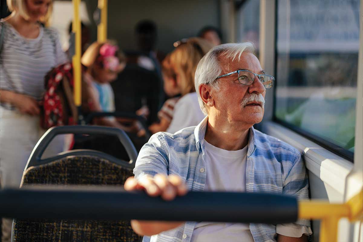 senior riding bus