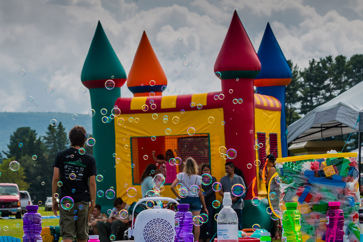Party with inflatable castle and bubbles