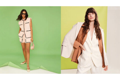 Two women modeling new clothes