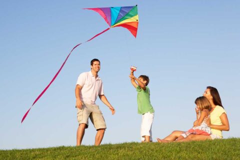 Family flying a kite