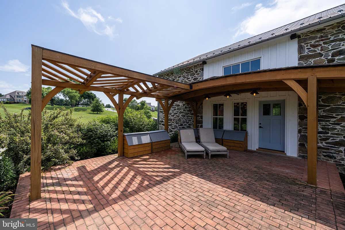 brick patio with wood awning