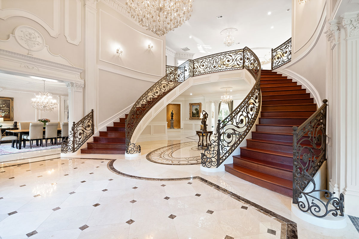 Grand foyer with dual staircase at 938 Peacock Station Rd., McLean
