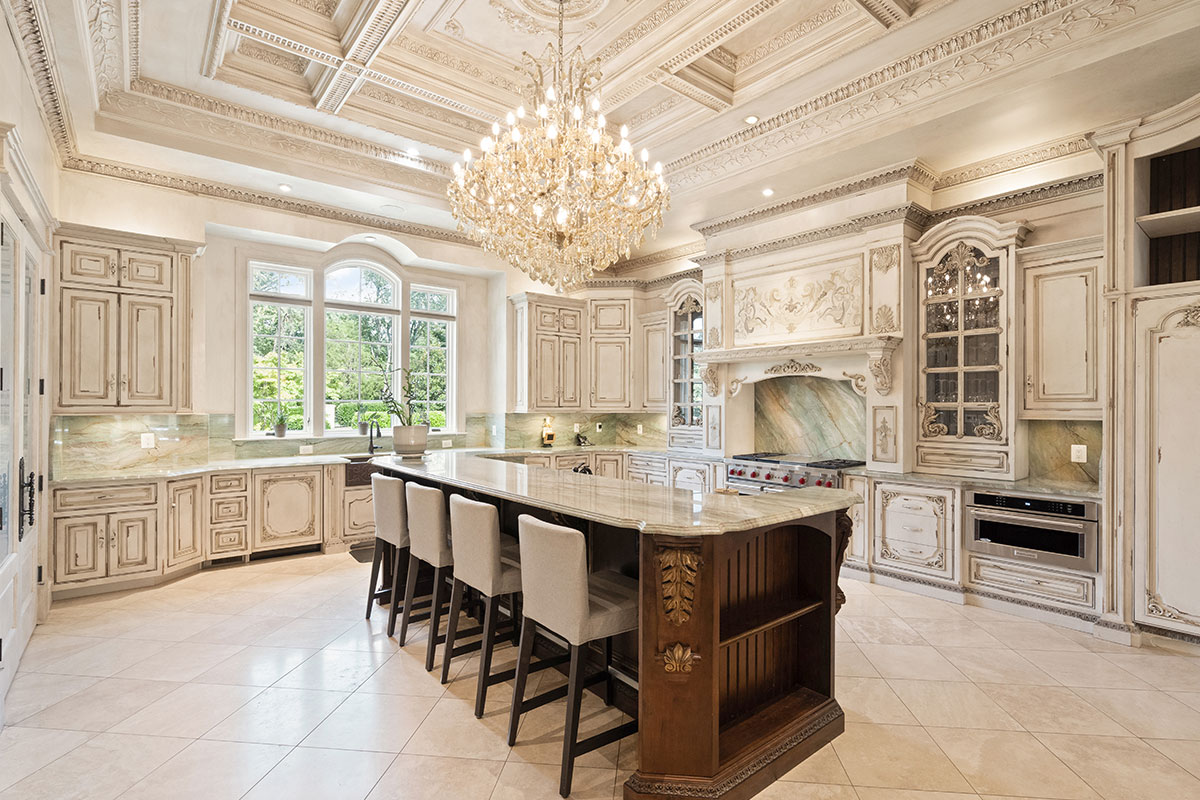 Kitchen with high ceilings and white cabinets at 938 Peacock Station Rd.