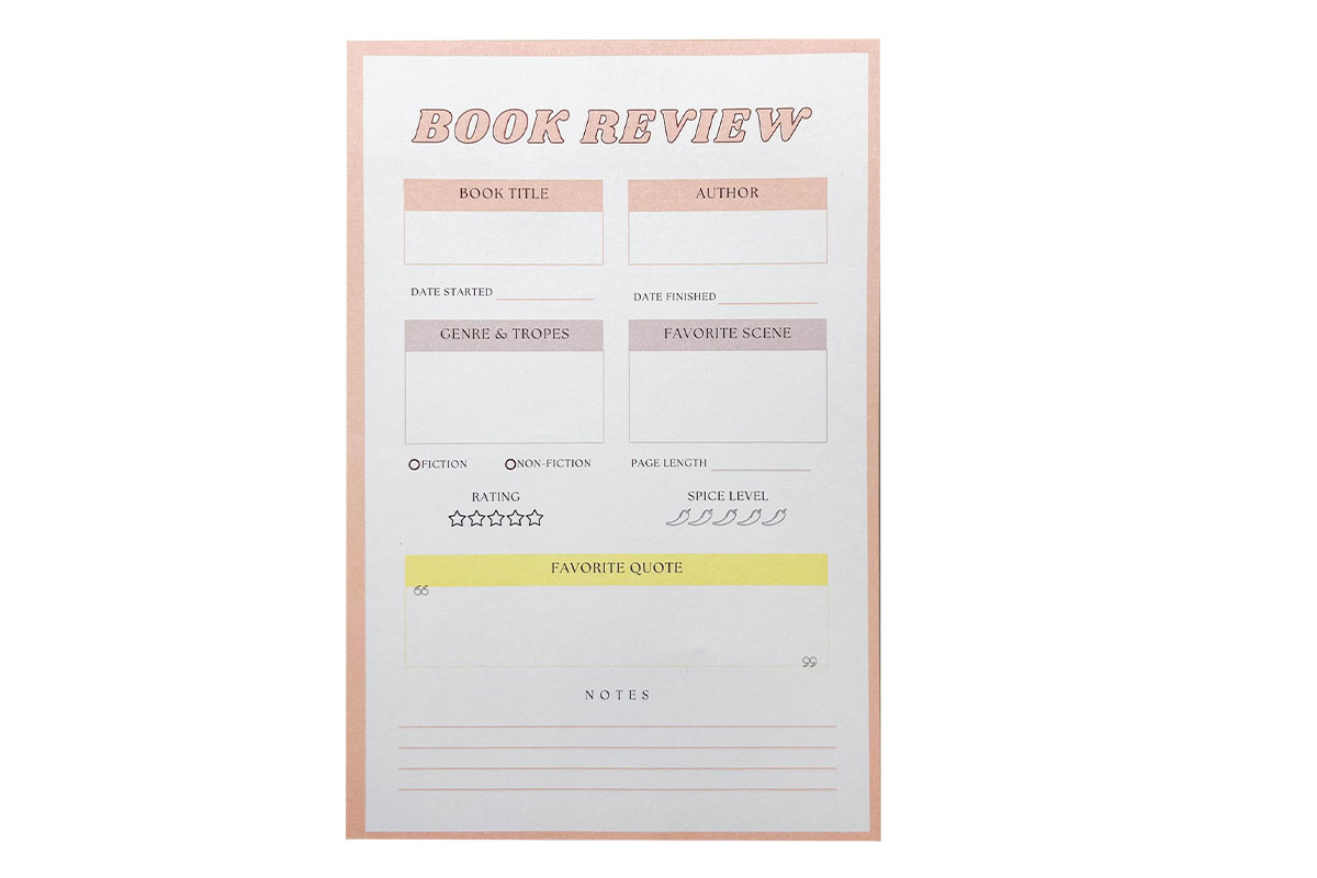 Sticky note with prompts to review books