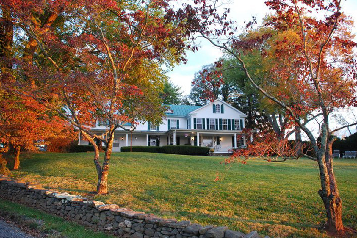 Exterior of Briar Patch Bed and Breakfast Inn with fall foliage