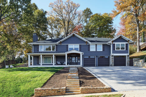 Exterior of blue brick house