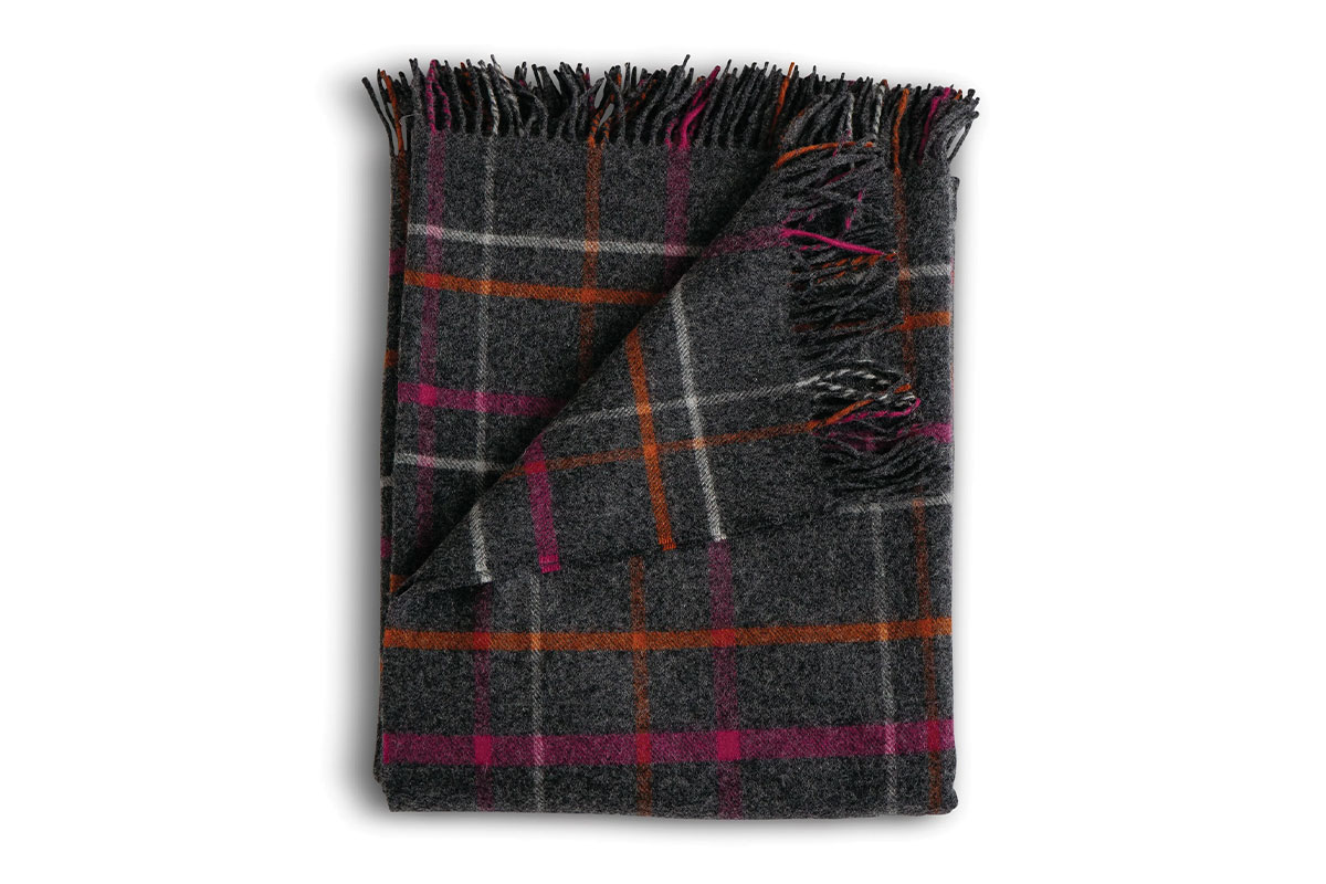 Grey blanket with red and pink plaid