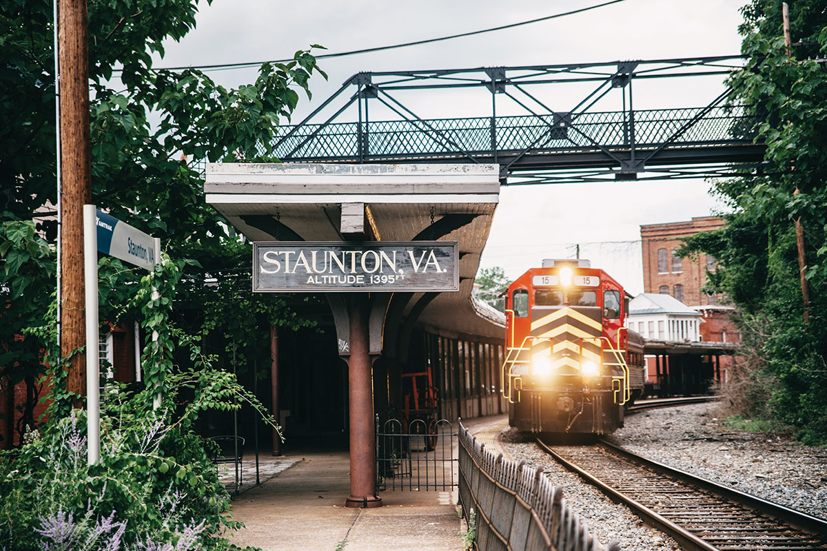Train approaching station labeled "Staunton, VA"