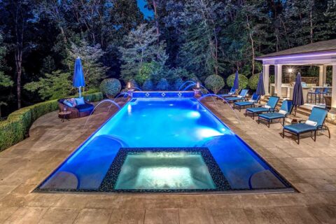 in-ground pool with spa