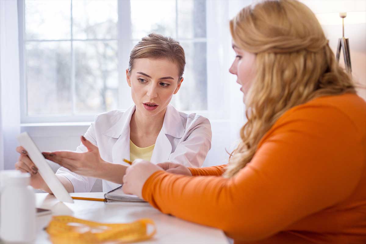woman talking to doctor about diabetes plan