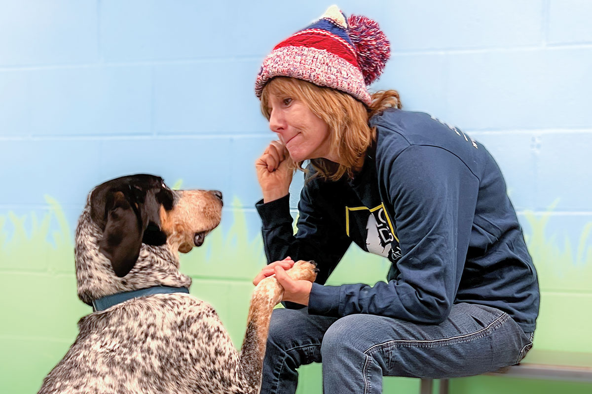 Pam McAlwee working with a dog