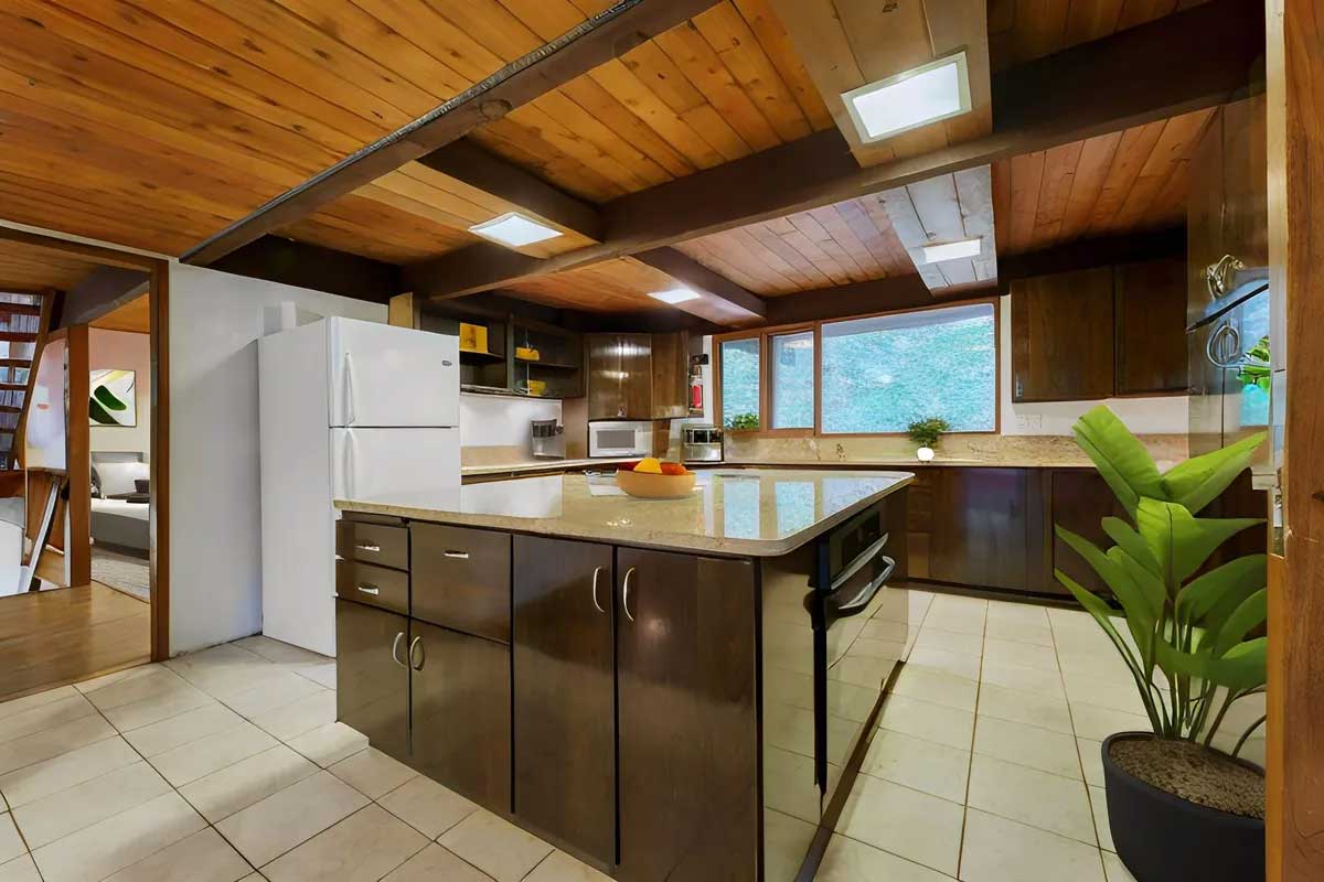 kitchen with island and wood ceilings